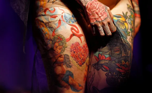 A tattooed model attends a fashion show at the “German Fetish Ball” in Berlin, Germany on May 12, 2018. (Photo by Hannibal Hanschke/Reuters)