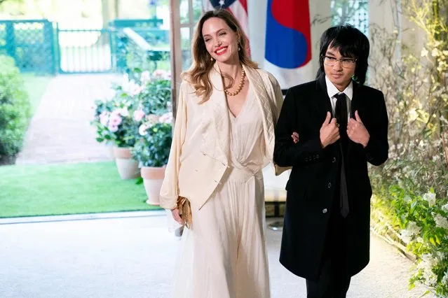 US actress Angelina Jolie and son Maddox arrive for the State Dinner in honor of South Korean President Yoon Suk Yeol, at the White House in Washington, DC, on April 26, 2023. (Photo by Stefani Reynolds/AFP Photo)