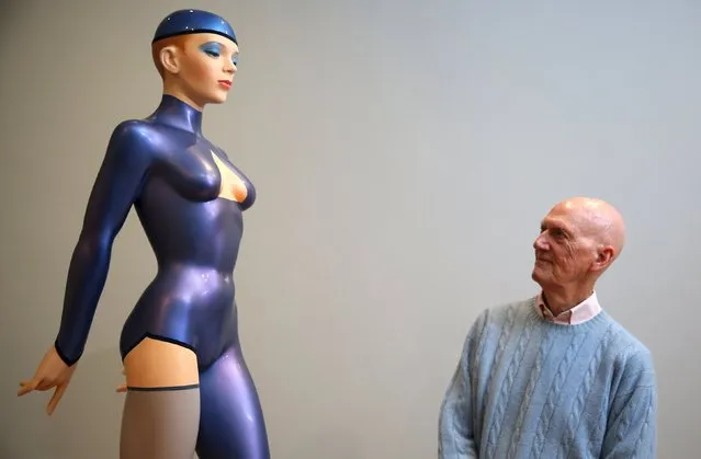 Artist Allen Jones poses for a portrait next to his work The Blue Gymnast (2015) at a preview of his exhibition "Colour Matters" in London, Britain November 24, 2015. (Photo by Neil Hall/Reuters)