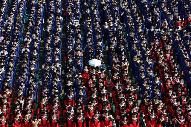 Graduates attend a graduation ceremony at Wuhan University on June 20, 2023 in Wuhan, China. China is forecasted to produce 11.58 million fresh graduates this year. (Photo by Getty Images)