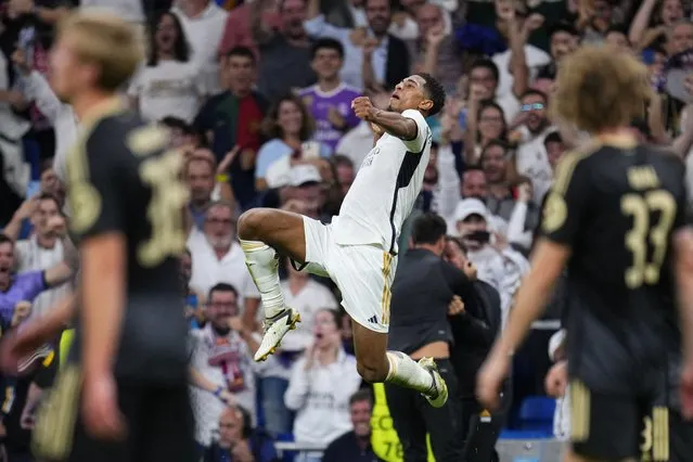 Real Madrid's Jude Bellingham celebrates after scoring his side's first goal during the Champions League group C soccer match between Real Madrid and FC Union Berlin at the Santiago Bernabeu stadium in Madrid, Wednesday, September 20, 2023. (Photo by Manu Fernandez/AP Photo)