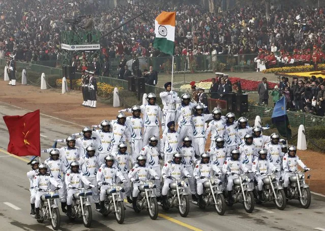 India's Border Security Force (BSF) “Daredevils” motorcycle riders take part during the Republic Day parade in New Delhi, India, January 26, 2016. (Photo by Altaf Hussain/Reuters)