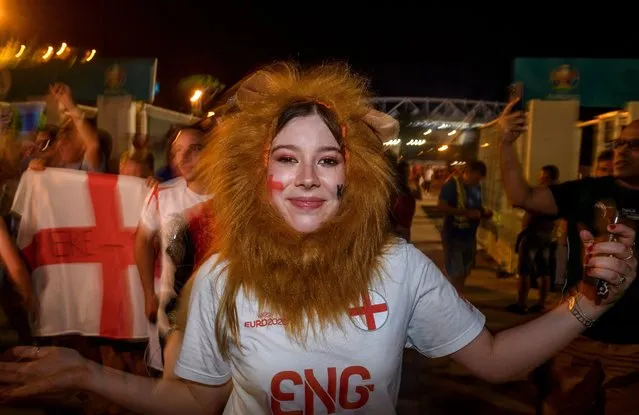 English fans celebrate the victory of England after the UEFA Euro 2020 Championship Quarter-final match between Ukraine and England played at the Olimpico Stadium, on July 3, 2021 in Rome, Italy. The winner of this match heads to the UEFA European Football Championship's semi-final match. The tournament was postponed from last year due to the Covid-19 pandemic. (Photo by Antonio Masiello/Getty Images)