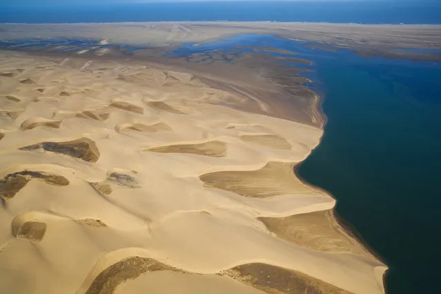 An aerial view of the Sandwich Harbour, in October, 2014, in the Namib Desert, Namibia. (Photo by Theo Allofs/Barcroft Media)