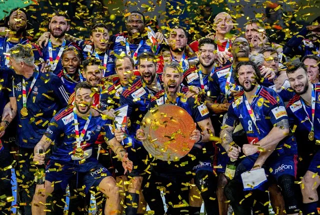 France's players celebrate during the victory ceremony after winning the Handball European Championship final match between France and Denmark in Cologne, Germany, Sunday, January 28, 2024. (Photo by Martin Meissner/AP Photo)