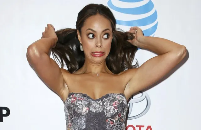 Actress Amber Stevens West adjusts her hair as she arrives at the 48th NAACP Image Awards in Pasadena, California, U.S., February 11, 2017. (Photo by Danny Moloshok/Reuters)