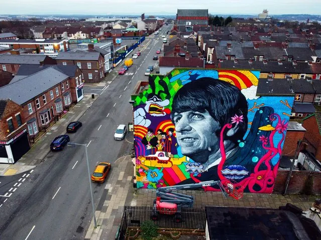 A mural of Ringo Starr, commissioned by Liverpool artist John Culshaw, is unveiled on the gable end of the Empress Pub on Admiral Street in Toxteth, Liverpool on Monday, March 7, 2022, acrossthe road from the childhood home of the former Beatle on Admiral Grove. (Photo by Peter Byrne/PA Images via Getty Images)