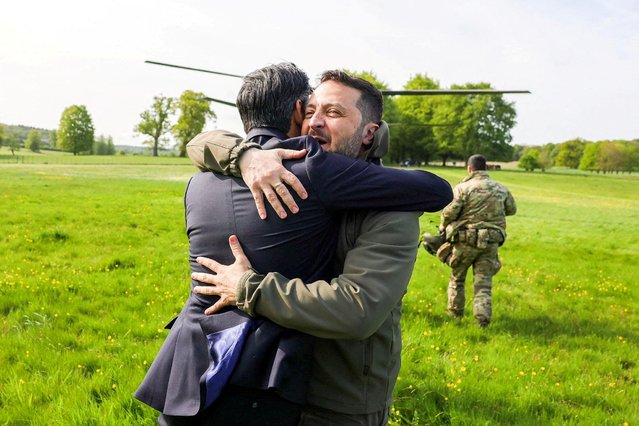 British Prime Minister Rishi Sunak hugs Ukrainian President Volodymyr Zelenskiy in Aylesbury, Britain on May 15, 2023. Ukrainian President Volodymyr Zelensky met in Britain on Monday with Prime Minister Rishi Sunak, who pledged “hundreds” of both air defence missiles and long-range attack drones to fend off Russia's invasion. (Photo by Rishi Sunak via Twitter)