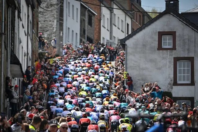 Cyclist ride up the “la cote de Saint-Roch” climb during the Liege-Bastogne-Liege one day cycling race, 257,5km from Liege to Liege in Liege on April 24, 2022. (Photo by Eric Lalmand/Belga via AFP Photo)