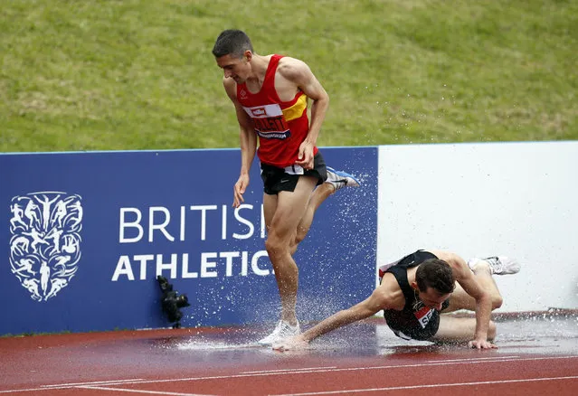 Britain Athletics, The British Championships, Alexander Stadium, Birmingham on June 25, 2016. Great Britain's Rob Mullett (L) and Zak Seddon who stumbles in the water during the 3000m steeplechase. (Photo by Andrew Boyers/Reuters/Action Images/Livepic)