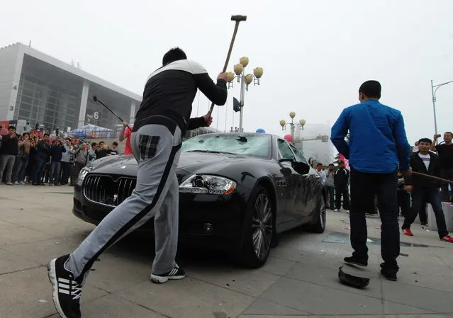 Man Smashes His Maserati In Protest In China
