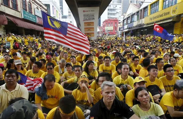 Supporters of pro-democracy group “Bersih” (Clean) gather at Jalan Tun Perak in Malaysia's capital city of Kuala Lumpur August 29, 2015. (Photo by Edgar Su/Reuters)