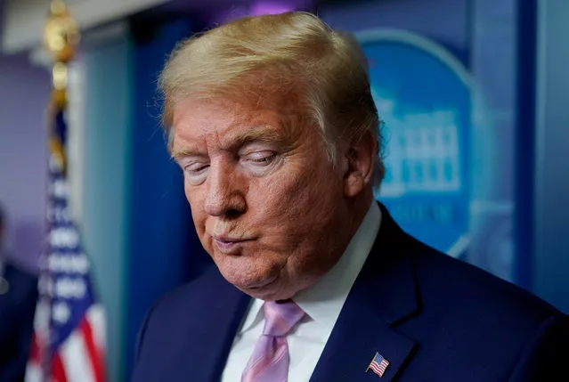 U.S. President Donald Trump reacts to a question during the daily coronavirus task force briefing at the White House in Washington, U.S., April 4, 2020. (Photo by Joshua Roberts/Reuters)