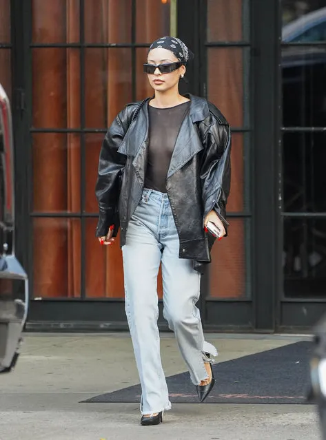 Alexa Demie is spotted while stepping out with a friend in New York City on August 25, 2022. The  The 31 year old Euphoria star wore a black jacket, a revealing sheer top, jeans, and heels. (Photo by The Image Direct)