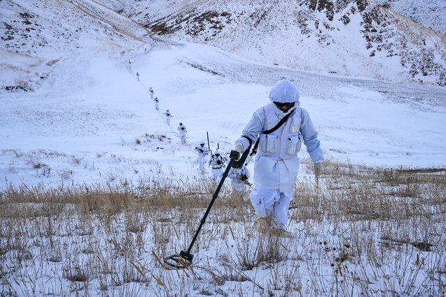 Turkish soldiers stationed at the Gulluk Border Post in Baskale district, located at an altitude of 2,800 meters near the Iranian border and 83 kilometers from the city center, patrol as continue their fight against terrorism, illegal migration, and smuggling despite harsh winter conditions in Van, Turkiye on December 28, 2024. Enduring challenging terrain and severe weather, the troops remain steadfast in their mission to protect the nation. (Photo by Ozkan Bilgin/Anadolu via Getty Images)