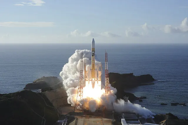 In this photo released by MHI, an H-IIA rocket with United Arab Emirates' Mars orbiter Hope lifts off from Tanegashima Space Center in Kagoshima, southern Japan Monday, July 20, 2020. A United Arab Emirates spacecraft rocketed away Monday on a seven-month journey to Mars, kicking off the Arab world’s first interplanetary mission. (Photo by MHI via AP Photo)