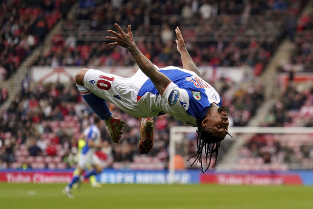 Blackburn Rovers' Tyrhys Dolan celebrates scoring his side's first goal during the Sky Bet Championship match between Sunderland and Blackburn Rovers, at the Stadium of Light, Sunderland, England, Monday April 21, 2025. (Photo by Owen Humphreys/PA Wire via AP Photo)