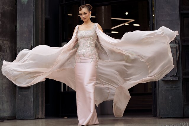 Turkish model Merve Gorgoz wears long beige or dusty pink embroidered maxi dress with a cape outside Rami Al Ali show during the Haute Couture Fall/Winter 2025/2026 as part of Paris Fashion Week on July 10, 2025 in Paris, France. (Photo by Raimonda Kulikauskiene/Getty Images)