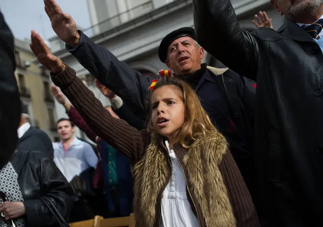A young girl gives the fascist salute during the 39th anniversary of the death of Spanish dictator General Francisco Franco at Plaza Oriente square on November 23, 2014 in Madrid, Spain. Franco ruled Spain from 1939 until his death in 1975 after a military coup and subsequent Civil War which left an estimated half a million dead. (Photo by Denis Doyle/Getty Images)