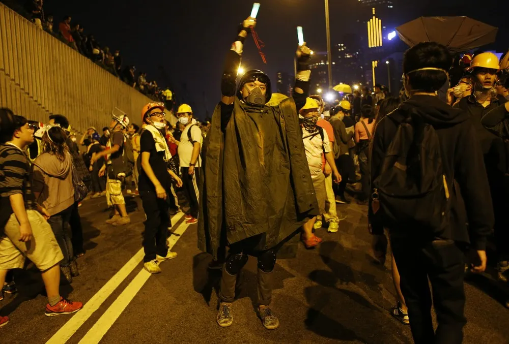 Hong Kong Protesters Scuffle with Police