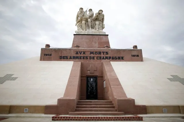 General view of the Navarin monument, a pyramid inaugurated at Sommepy-Tahure in 1924 to pay tribute to World War I soldiers killed in Champagne, eastern France, November 3, 2015. The ossuary is the shelter of more than 10,000 unidentified corpses of soldiers. Inside there is a chapel which walls are covered with plates placed by the families in memory of the dead soldiers, among them a plate placed there by Ivaldi's father, Jean-Joseph in honour of his son. The soldier died for France on April 30, 1917. (Photo by Charles Platiau/Reuters)