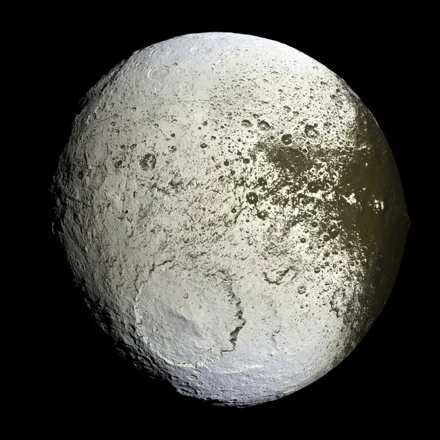 The planet Saturn's moon Iapetus is shown in the first high-resolution image taken September 10, 2007 by NASA's Cassini spacecraft. (Photo by Reuters/NASA/JPL/Space Science Institute)