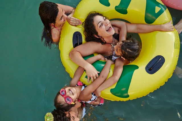 From the rocks of Arnhem Land to the backyards of the Sydney suburbs, from stretching by the pool to waiting for evening prayer, snapshots for the 2015 Australian Life prize demonstrated a nation in colour and motion. Here: Floatie. (Photo by Henrique Fanti-Floatie/Australian Life Prize 2015)