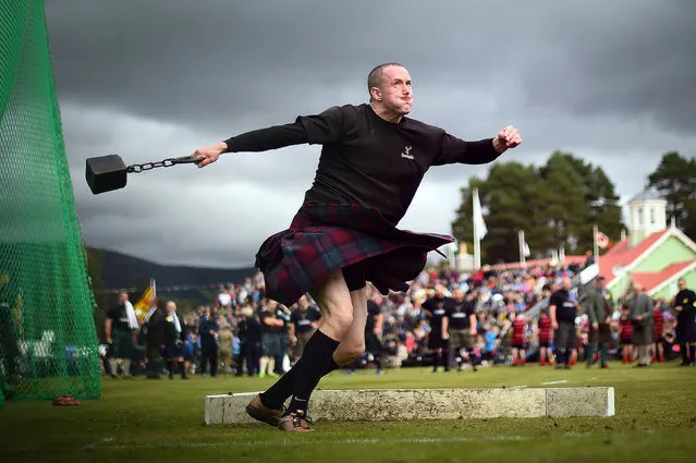 A competitor takes part in the Hammer Throw event at the annual Braemar Gathering in Braemar, central Scotland, on September 1, 2018. The Braemar Gathering is a traditional Scottish Highland Games which predates the 1745 Uprising, and since 1848 it has been regularly attended by the reigning Monarch Queen Elizabeth and members of the Royal Family. (Photo by Andy Buchanan/AFP Photo)