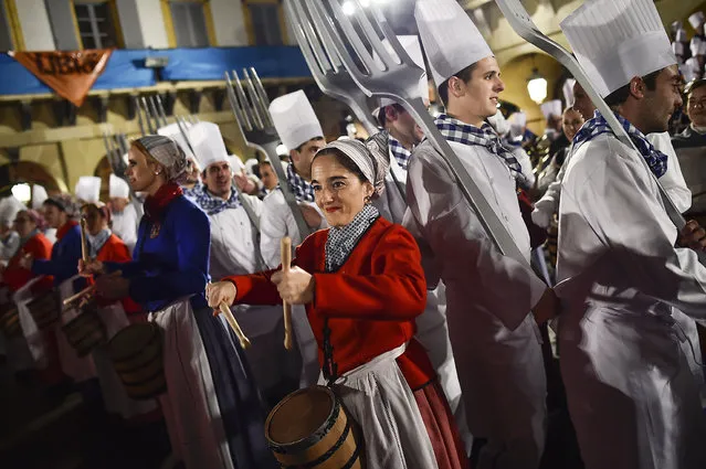 “Tamborilleros” wearing their uniforms take part in the opening ceremony of the main day of the traditional “La Tamborrada” of San Sebastian feasts in the Basque city of San Sebastian, northern Spain, Wednesday, January 20, 2016. (Photo by Alvaro Barrientos/AP Photo)