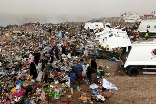 Garbage pickers collect recyclable materials at a garbage dump in Erbil, in Iraq's northern autonomous Kurdistan region, February 21, 2016. (Photo by Azad Lashkari/Reuters)
