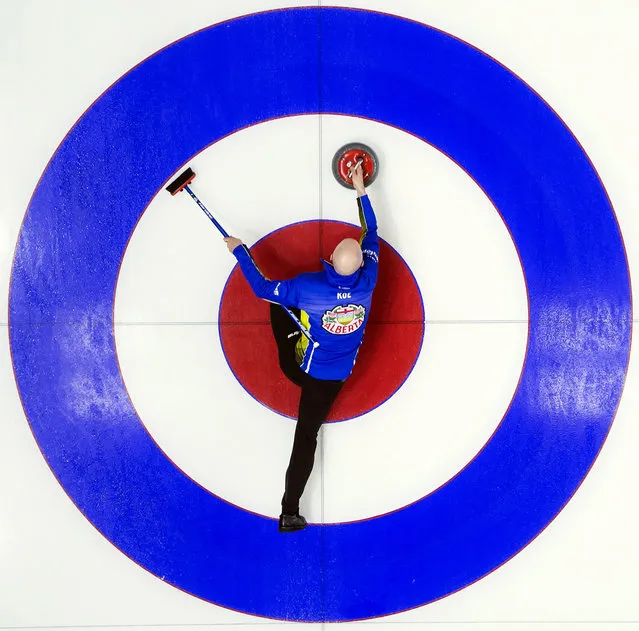 Team Alberta skip Kevin Koe makes a shot during the 10th draw against team British Columbia at the Brier curling tournament in Brandon, Manitoba, Tuesday, March, 5, 2019. (Photo by Jonathan Hayward/The Canadian Press via AP Photo)