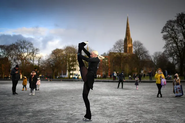Skater Suzie Murray skates a Queens Park pond as new Covid–19 rules come into effect on January 5, 2021 in Glasgow, Scotland. New lockdown restrictions forbidding people from leaving home for non-essential reasons have come into force across the Scottish mainland. (Photo by Jeff J. Mitchell/Getty Images)