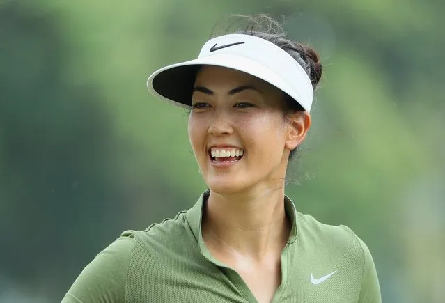 Michelle Wie of the USA smiles on the 18th hole during the second round of the HSBC Women's Champions on the Tanjong Course at Sentosa Golf Club on March 3, 2017 in Singapore. (Photo by Andrew Redington/Getty Images)