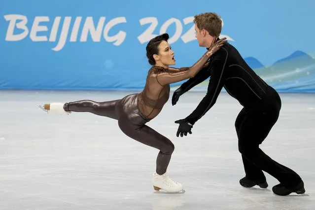 Figure skating couple Madison Chock and Evan Bates, of the USA, practice their dance routine during a training session at the 2022 Winter Olympics, Thursday, February 3, 2022, in Beijing. At the Beijing Winter Games, opening Friday, it’s a homecoming of sorts for one of the world’s most sprawling diasporas – often sweet and sometimes complicated, but always a reflection of where they are, where they come from and the Olympic spirit itself. “Every time I’m on the bus, I’m just looking out and studying the city and just imagining my roots are here, my ancestors are here”, says Chock, whose father is Chinese-Hawaiian, with family ties to rural China. (Photo by Natacha Pisarenko/AP Photo)