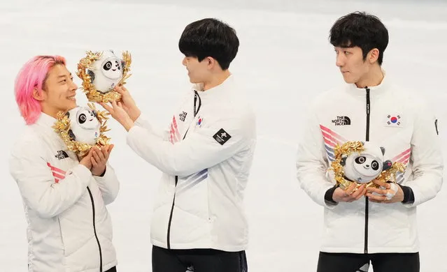 Silver medallists of the team of South Korea celebrate during the Men's 5000m Short Track Speed Skating Relay Final A flower ceremony on day twelve of the Beijing 2022 Winter Olympic Games at Capital Indoor Stadium on February 16, 2022 in Beijing, China. (Photo by Aleksandra Szmigiel/Reuters)