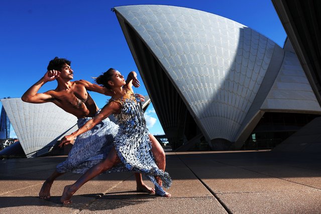 Bangarra Dance Theatre dancers Daniel Mateo and Lillian Banks pose on the Opera House forecourt during a media call for Bangarra Dance Theatre's new work “Horizon” at Sydney Opera House on June 12, 2024 in Sydney, Australia. (Photo by Don Arnold/WireImage)