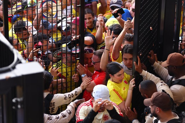 Fans try to enter the stadium during the CONMEBOL Copa America 2024 Final match between Argentina and Colombia at Hard Rock Stadium on July 14, 2024 in Miami Gardens, Florida. (Photo by Maddie Meyer/Getty Images)