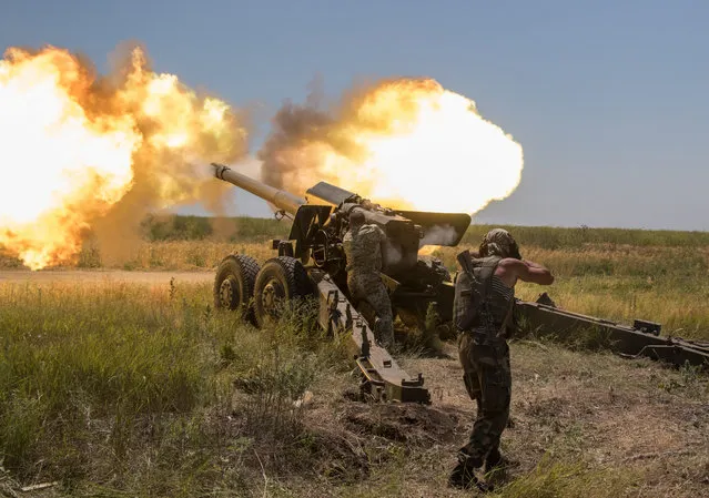 Ukrainian servicemen fire a 152 mm 2A36 Giatsint-B (M1976) 152-mm towed gun during a military exercise on a shooting range near  Mariupol, Ukraine, 30 June 2017. The OSCE Special Monitoring Mission (SMM) to Ukraine evacuated its office from the town of Popasna in Luhansk region on 30 June, due to the militant shelling according to the Ukrainian side of the Joint Centre for Control and Coordination report. (Photo by Sergey Vaganov/EPA)