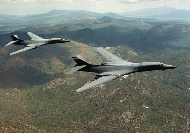 A pair of B-1B Lancer bombers soar over Wyoming in an undated file photo. (Photo by Staff Sgt. Steve Thurow/Reuters/U.S. Air Force)
