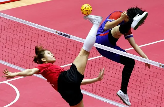 Vietnam's Duong Thi Xuyen in action against Malaysia in the women's sepak takraw at Hoang Mai Sports Center in Hanoi, Vietnam on May 14, 2022. (Photo by Navesh Chitrakar/Reuters)