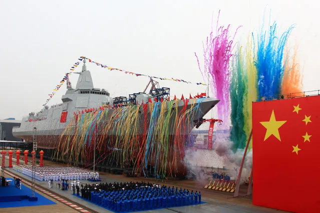 China's new type of domestically-built destroyer, a 10,000-tonne warship, is seen during its launching ceremony at the Jiangnan Shipyard in Shanghai, China June 28, 2017. (Photo by Reuters/China Stringer Network)