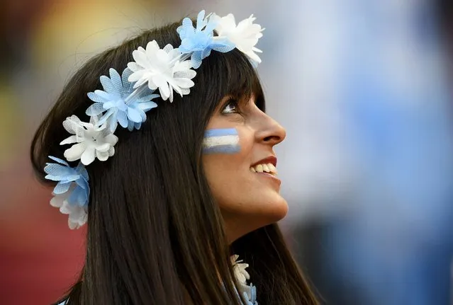 An Argentina fan smiles before the team's 2014 World Cup quarter-finals against Belgium at the Brasilia national stadium in Brasilia July 5, 2014. (Photo by Dylan Martinez/Reuters)