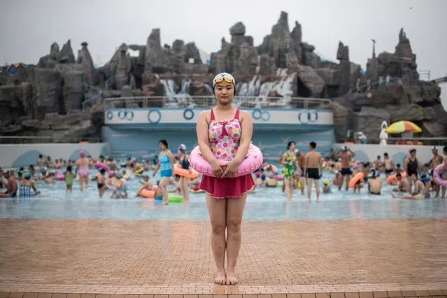 In this photo taken on July 21, 2017, swimmer Ri Song-Hui (21) poses for a portrait at the Munsu Water Park in Pyongyang. (Photo by Ed Jones/AFP Photo)