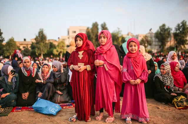 Muslims gather to perform the Eid Al Adha prayer at Es-Saraya Square in Gaza City, Gaza on September 1, 2017. Muslims worldwide celebrate Eid Al-Adha, to commemorate the holy Prophet Ibrahim's (Prophet Abraham) readiness to sacrifice his son as a sign of his obedience to God, during which they sacrifice permissible animals, generally goats, sheep, and cows. Eid-al Adha is the one of two most important holidays in the Islamic calendar, with prayers and the ritual sacrifice of animals. (Photo by Mustafa Hassona/Anadolu Agency/Getty Images)
