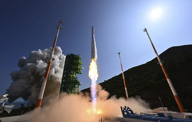 The Nuri rocket, the first domestically produced space rocket, lifts off from a launch pad at the Naro Space Center in Goheung, South Korea, Tuesday, June 21, 2022. South Korea successfully launched its first homegrown space rocket on Tuesday, officials said, a triumph that boosted the country's growing space ambitions but also proved it has key technologies to build a space-based surveillance system and bigger missiles amid animosities with rival North Korea. (Photo by Korea Pool/Yonhap via AP Photo)