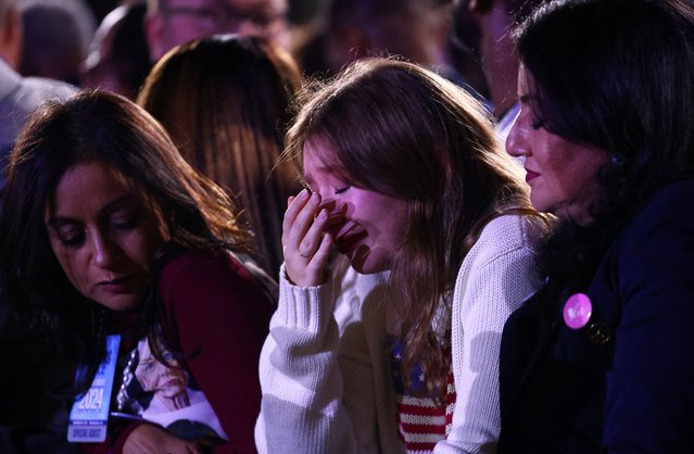 Supporters react to early election results at Kamala Harris' election night rally at Howard University in Washington on November 6, 2024. (Photo by Daniel Cole/Reuters)