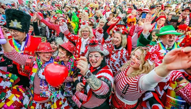 Costumed revelers celebrate in Cologne, Germany, 11 November 2022. The German carnival, the so-called fifth season, starts each year on 11 November at 11:11 am and ends on Ash Wednesday of the following year. (Photo by Friedemann Vogel/EPA/EFE/Rex Features/Shutterstock)