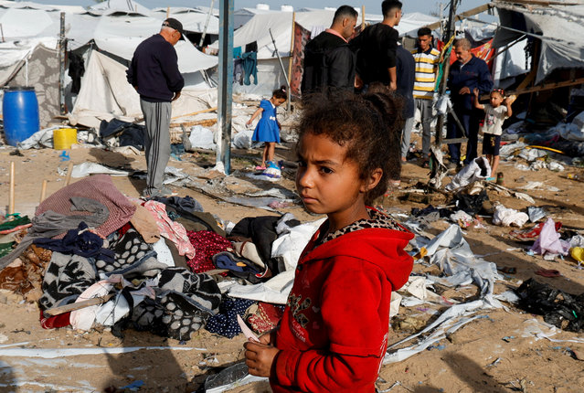 A Palestinian child looks on at the site of an Israeli strike on a tent site housing displaced people, in Khan Younis, in the southern Gaza Strip, on April 3, 2025. (Photo by Hatem Khaled/Reuters)