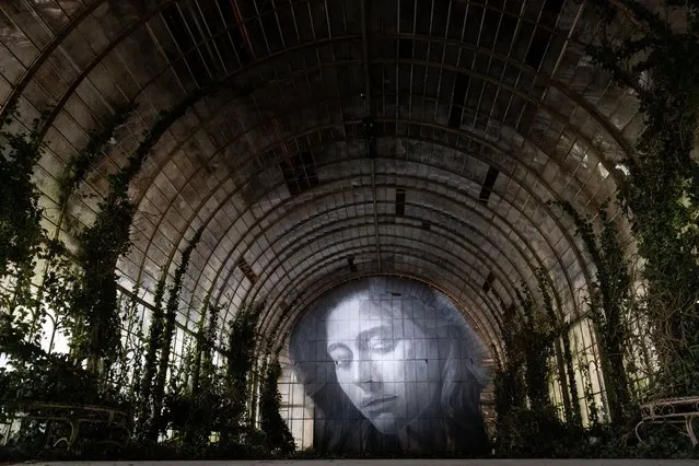 An installation featuring one of Rone’s murals in the glassroom during a media preview of Time by Melbourne artist Tyrone “RONE” Wright at Flinders Street Station on October 27, 2022 in Melbourne, Australia. The immersive installation is made up of eleven transformed rooms across the hidden upper level and ballroom of Flinders Street Station. Time by RONE will open on 28 October 2022 and will run to 30 April 2023. (Photo by Asanka Ratnayake/Getty Images)