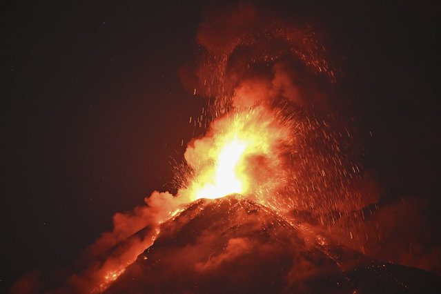 Fuego volcano erupts as seen from Alotenango, Sacatepequez department, some 65 kilometres southwest Guatemala City on March 10, 2025. Nearly a thousand people were evacuated early Monday morning following a new eruption of the Fuego volcano in Guatemala, near the capital and considered the most active in Central America. (Photo by Johan Ordonez/AFP Photo)